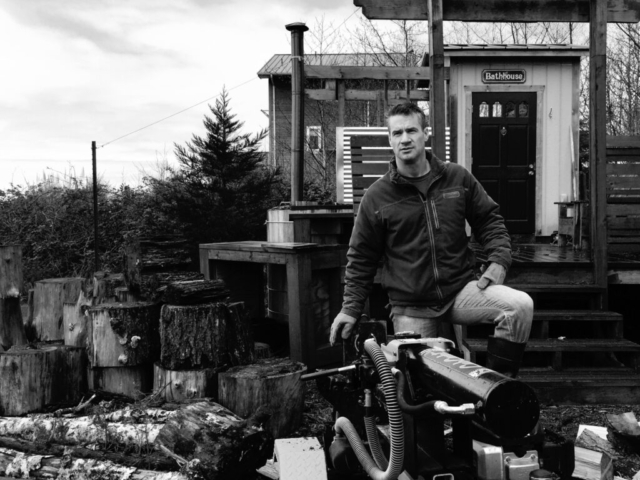 Photo of man chopping wood